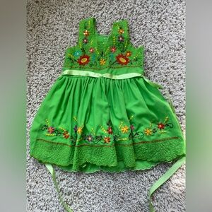 Handmade green toddler girl dress with embroidered flowers from Mexico